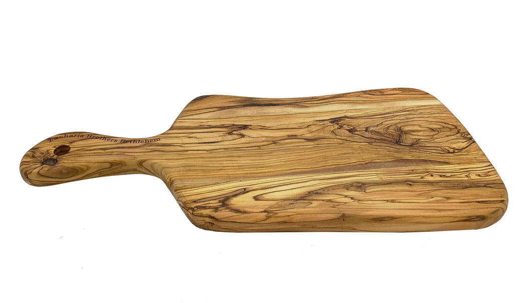 https://www.shenandoahhomesteadsupply.com/cdn/shop/products/olive-wood-paddle-handle-cutting-boards-including-oil-made-in-bethlehem-584585_530x@2x.jpg?v=1697819137